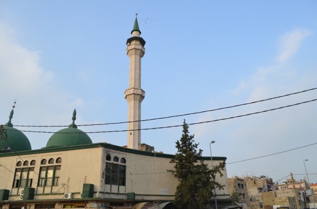 The mosque and its bullet holes.
